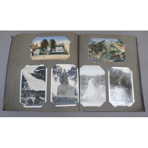 298 - Postcards, an album of colour and monochrome postcards c.1910 to include Raphael Tuck & Sons' M Jacq... 