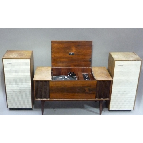 313 - A Dynatron model GR13 record player fitted with a Garrard 3000 turntable, with lift up top, together... 