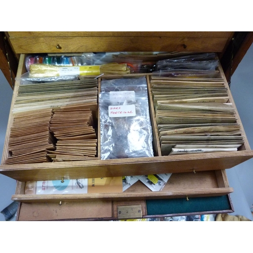 317 - A cabinet of fly tying materials 1950s and later including, tools, colour threads, large selection o... 