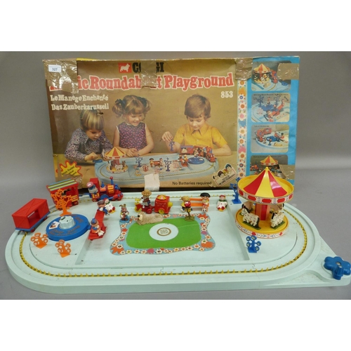 327 - A Corgi Magic Roundabout playground, in original box (tatty)