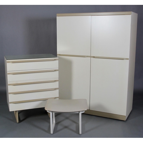 142 - Uniflex International Furniture, a two tone cream two door wardrobe and five drawer chest with bar h... 