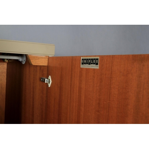 142 - Uniflex International Furniture, a two tone cream two door wardrobe and five drawer chest with bar h... 