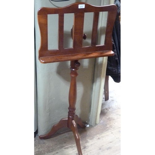 123 - A modern music stand on tripod base