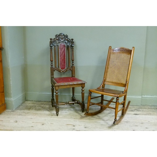 130 - A Victorian oak Jacobian revival hall chair, the pierced carved cresting of lions around a vacant ca... 