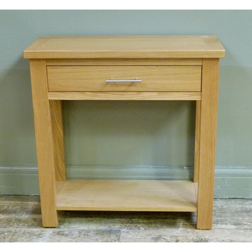 143 - A reproduction oak single drawer side table with undertier, 76cm wide
