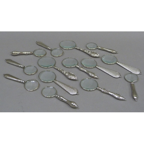 162 - A quantity of magnifying glasses with decorative handles