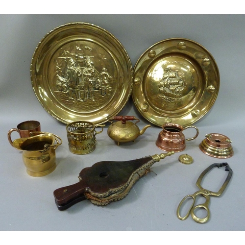 163 - A quantity of copper and brassware including pair of chargers, bellows, ashtray, etc