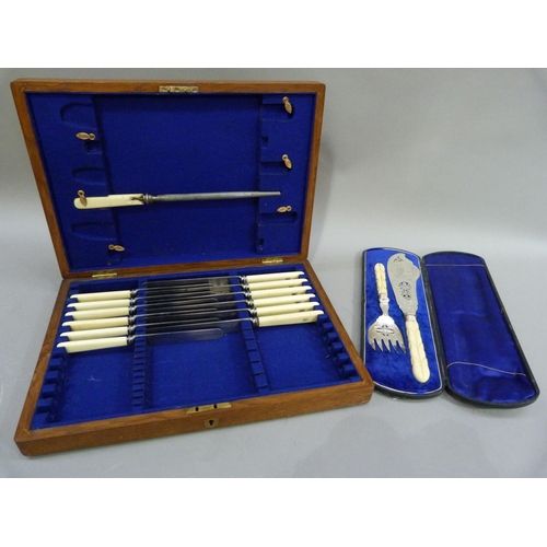 165 - A pair of Victorian silver plated fish servers with pierced and engraved blades and ivory handles, c... 