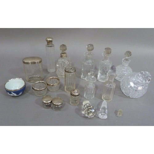 168 - A quantity of silver topped jars and bottles, salts, etc, together with a small quantity of cut glas... 