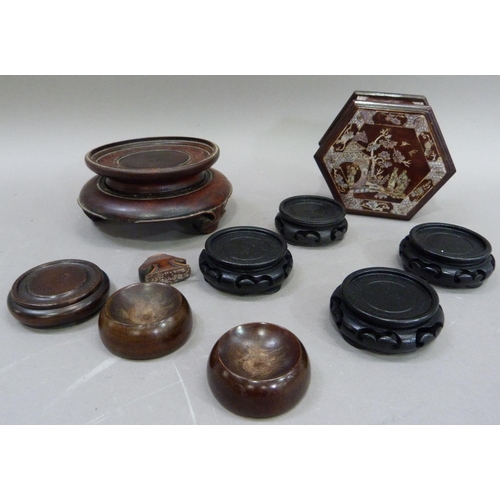 169 - A Chinese hardwood hexagonal box and cover decorated in mother of pearl with chinoiserie scene withi... 