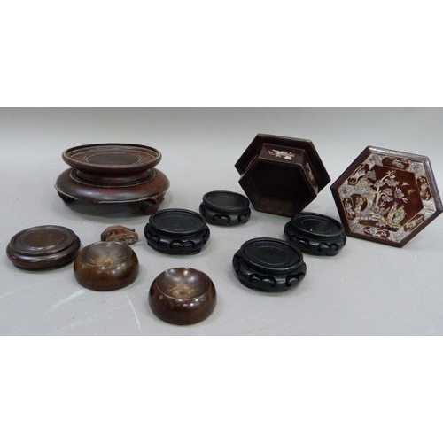 169 - A Chinese hardwood hexagonal box and cover decorated in mother of pearl with chinoiserie scene withi... 