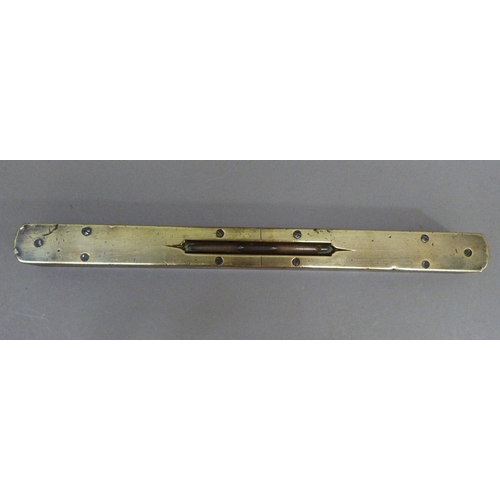 55 - A Victorian brass mounted rosewood level of rounded rectangular form, 30cm long