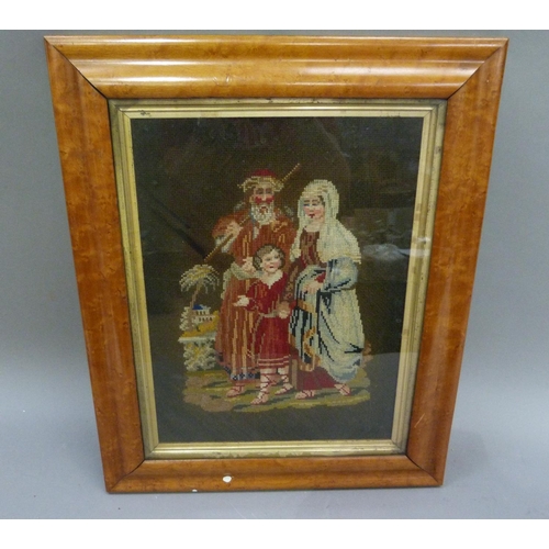 391 - A Victorian needlework picture of couple and child in landscape worked in gros and petite pois, gilt... 