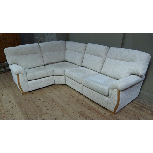 411 - A large modern upholstered L shaped sofa upholstered in cream chenille by High Seat Ltd