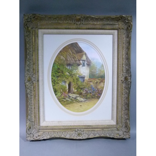 417 - Maddra - cottage exterior with hollyhocks, oval, signed, 40cm x 30cm, framed