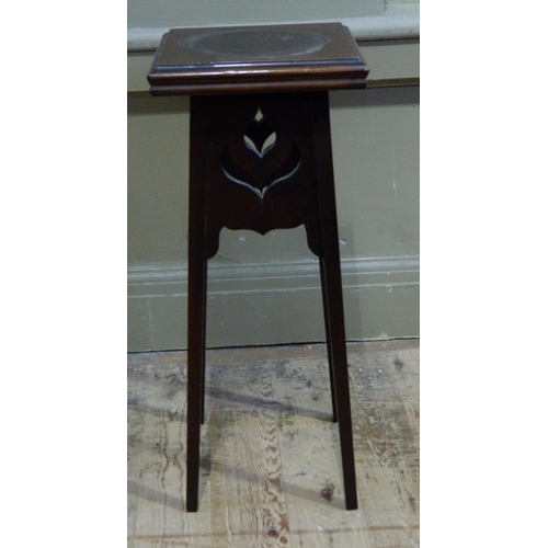 132 - A small carved mahogany plant stand, 67cm high