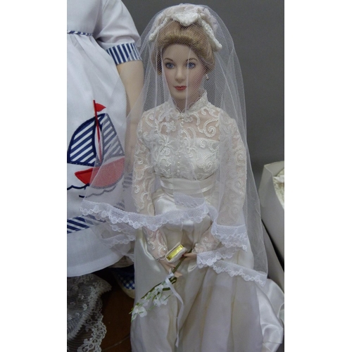 148 - A collection of modern porcelain headed dolls including Marie Antoinette and Princess Grace of Monac... 