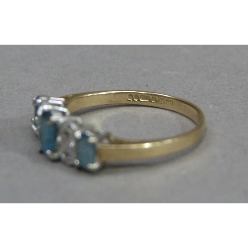 360 - A blue topaz and diamond set dress ring in 9ct gold, approximate weight 2gm