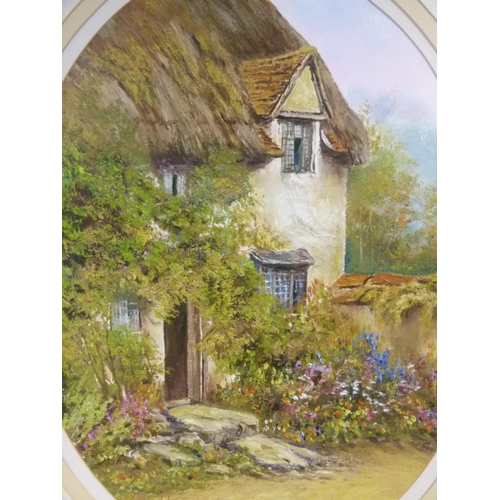 417 - Maddra - cottage exterior with hollyhocks, oval, signed, 40cm x 30cm, framed