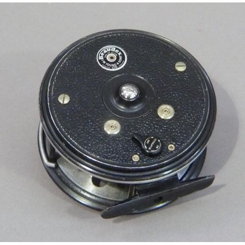 153 - A JW Young and Sons limited Beaudex fly reel with black japanned pierced aluminum spool and foot wit... 