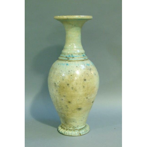 39 - A baluster vase with everted rim, the raku glaze tinted from duck egg blue to turquoise. on circular... 