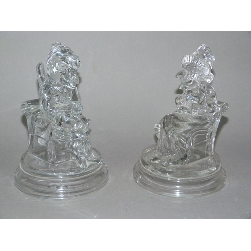 58 - A pair of moulded glass figures of Punch and Judy, the bases moulded with J P and anchor mark, 17.5c... 