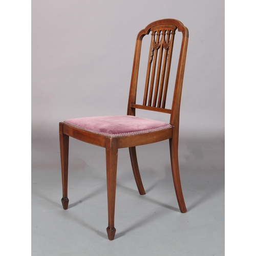 97 - An Edward VII mahogany single chair inlaid with boxwood stringing, having an arched top rail above a... 