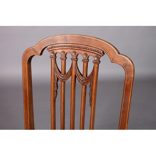 97 - An Edward VII mahogany single chair inlaid with boxwood stringing, having an arched top rail above a... 