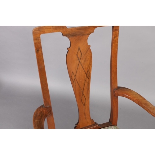 107 - An Edwardian figured mahogany elbow chair, the vase shaped splat inlaid with parquetry stringing, dr... 