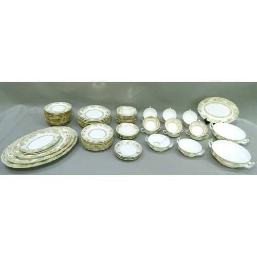 181 - A large quantity of Noritake dinner ware, pale lemon and gilt in two designs, briefly comprising mea... 