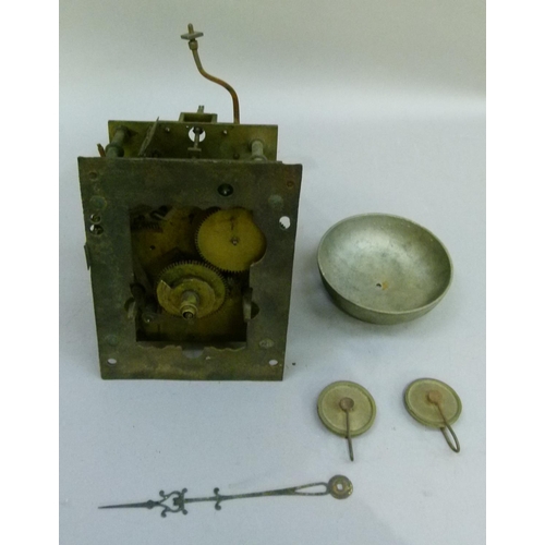 186 - A clock movement, the back plate marked W Francis Birmingham complete with bell and pulleys for the ... 