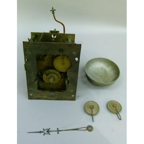 186 - A clock movement, the back plate marked W Francis Birmingham complete with bell and pulleys for the ... 