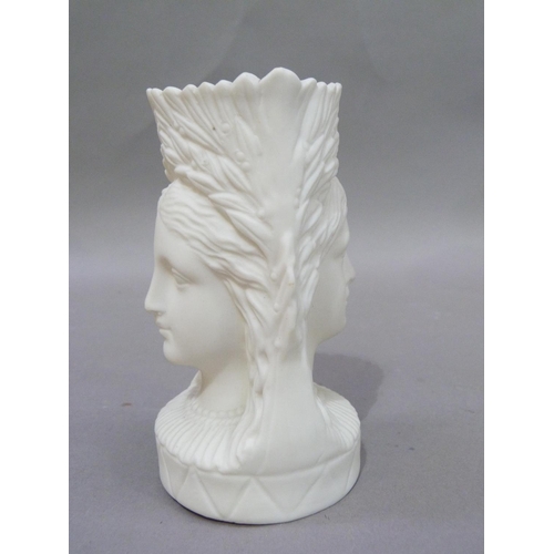 4 - A 19th Century Parian double headed mug moulded as a female with long flowing tresses and a crown of... 