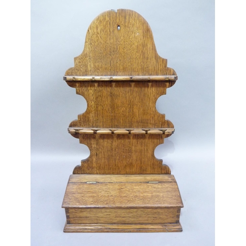 46 - An oak spoon rack with candle box, 55cm H x 31cm W