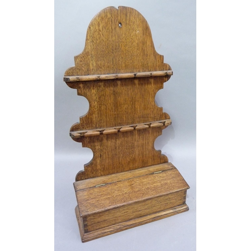 46 - An oak spoon rack with candle box, 55cm H x 31cm W