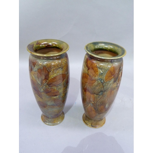 5 - A pair of Royal Doulton stoneware vases, decorated with impressed leaves in an autumnal glaze, impre... 