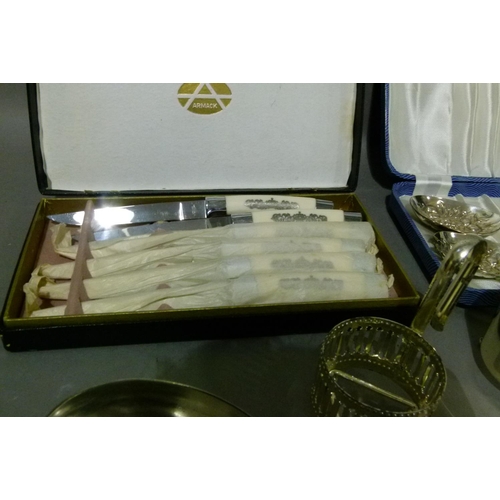 75 - A cased set of six EPNS coffee spoons, a box of steak knives with ivorine handles, a cased set of EP... 