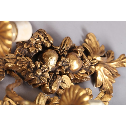 93 - Pair of gilt plaster and metal twin wall lights, modelled as fruit and foliage, the writhen serpenti... 