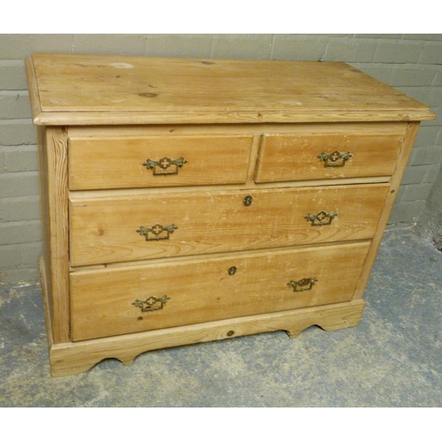 134 - A late Victorian strip pine chest, the rectangular top with moulded lip above two short and two long... 