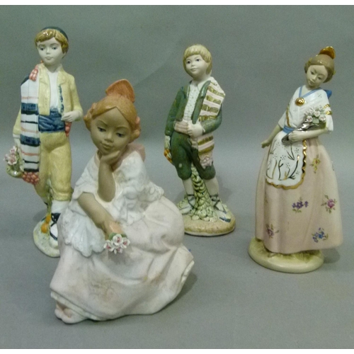 182 - Four various Nadal hand made Spanish figures, one sitting and three standing