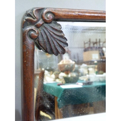 204 - A mahogany wall mirror with palmette corners, 39cm x33cm