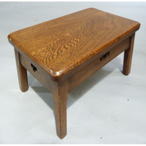 245 - An oak rectangular stool, the deep apron with quatrefoil cut outs and on square chamfered legs, 41cm... 