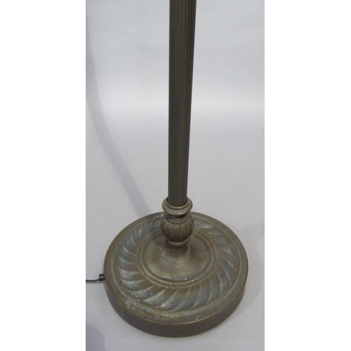 259 - A Tiffany style up lighter with trumpet shaped shade on a reeded column and circular base, 180cm