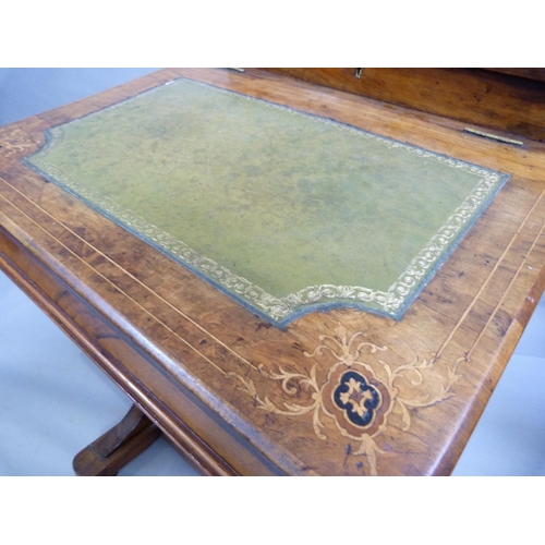 279 - A Victorian walnut Davenport inlaid in box and ebony with foliate scrolls having a raised stationery... 