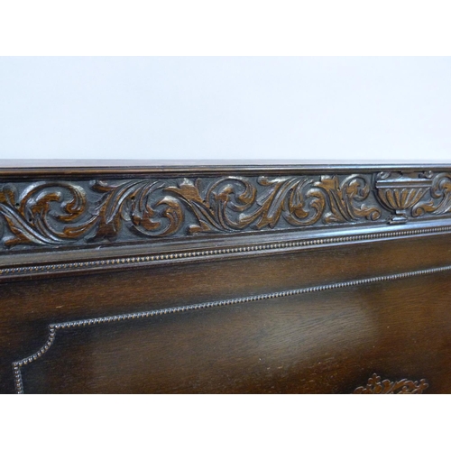283 - A 1920s Oak double bed stead (no irons)