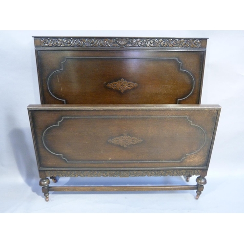 283 - A 1920s Oak double bed stead (no irons)