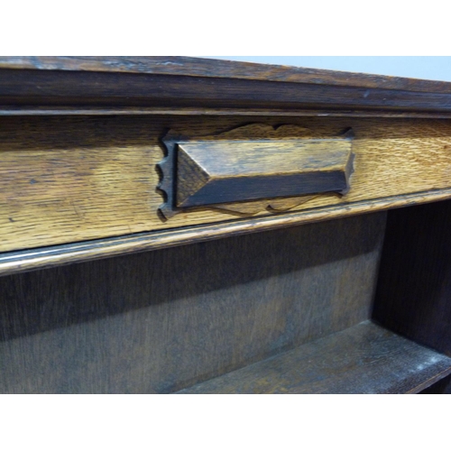 311 - A 1930's set of oak and plywood bookshelves on plinth base, 78cm W x 128cm H