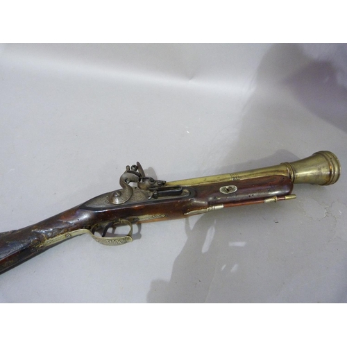 89 - A 19th century brass barreled percussion cap blunderbuss the barrel initialled FT and D? LG to top o... 