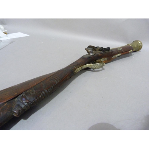 89 - A 19th century brass barreled percussion cap blunderbuss the barrel initialled FT and D? LG to top o... 