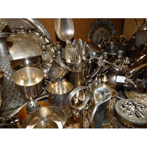 91 - A large quantity of silver plated ware to include carafes, decanters, trays, goblets, coffee spoons ... 